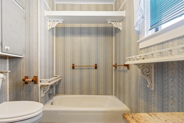 273 E Live Oak Ave, Defuniak Springs, FL 32435 - bathroom with wallpapered walls and a bathtub
