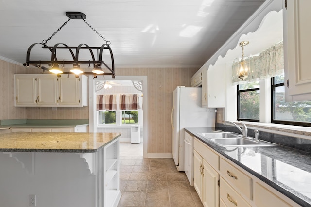 273 E Live Oak Ave, Defuniak Springs, FL 32435 - kitchen featuring wallpapered walls, crown molding, open shelves, stone countertops, and hanging light fixtures