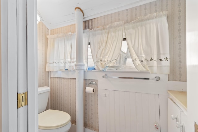 273 E Live Oak Ave, Defuniak Springs, FL 32435 - half bathroom featuring toilet and vanity