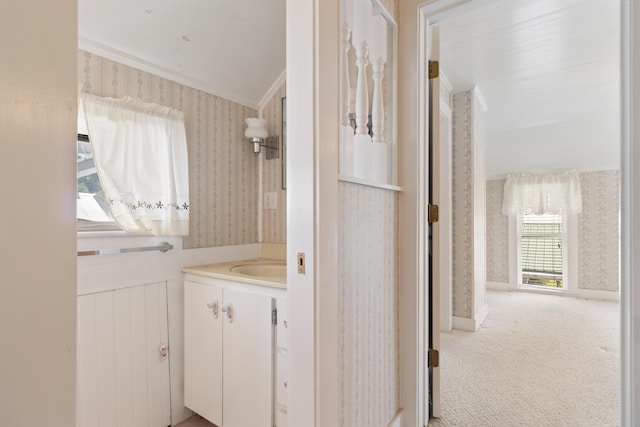 273 E Live Oak Ave, Defuniak Springs, FL 32435 - bathroom featuring wallpapered walls, ornamental molding, and vanity