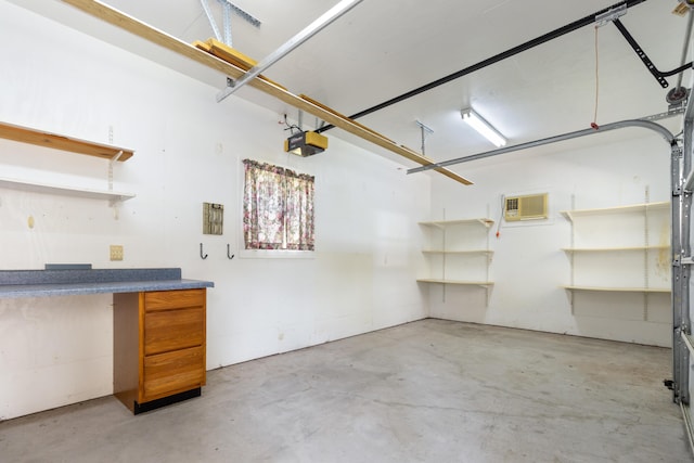 273 E Live Oak Ave, Defuniak Springs, FL 32435 - garage featuring a garage door opener and an AC wall unit