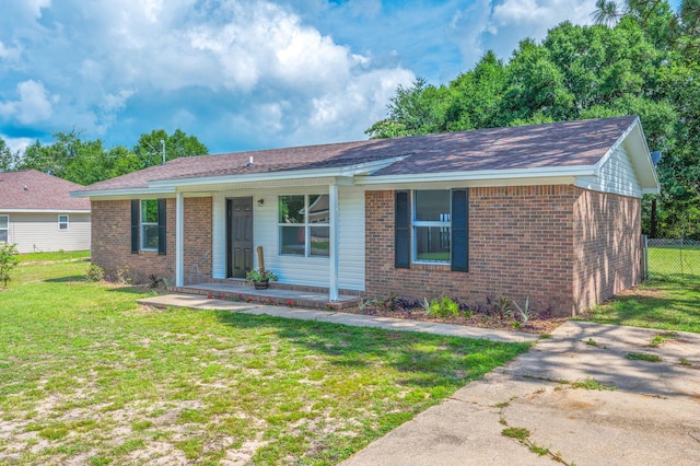3375 Mclain Dr, Crestview, FL 32539 - single story home with brick siding, a porch, and a shingled roof