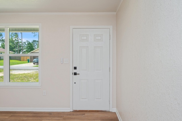 3375 Mclain Dr, Crestview, FL 32539 - entryway featuring wood finished floors and crown molding
