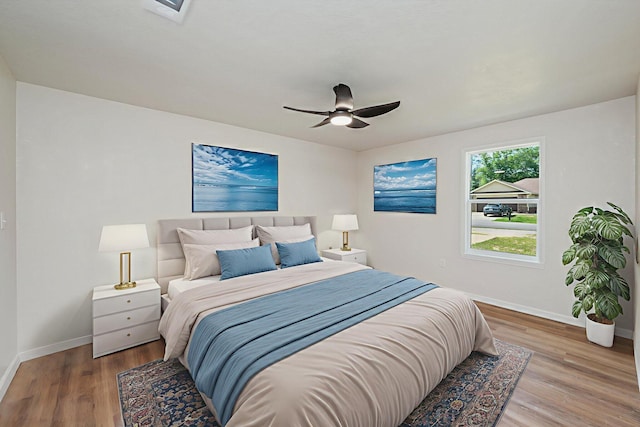 3375 Mclain Dr, Crestview, FL 32539 - bedroom with wood finished floors and a ceiling fan