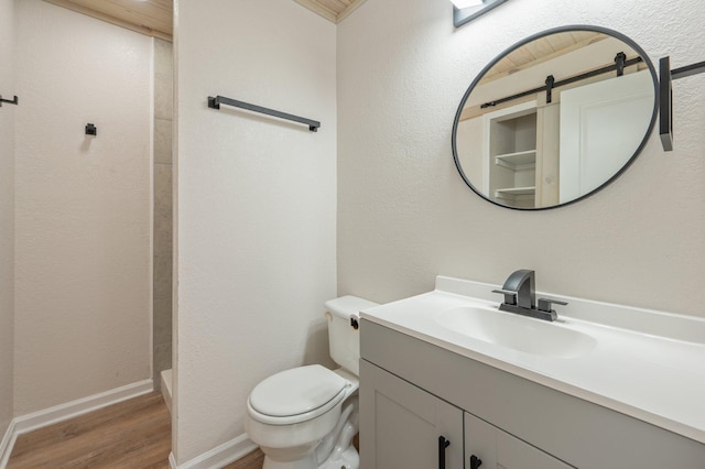 3375 Mclain Dr, Crestview, FL 32539 - full bathroom with wood finished floors, vanity, and walk in shower
