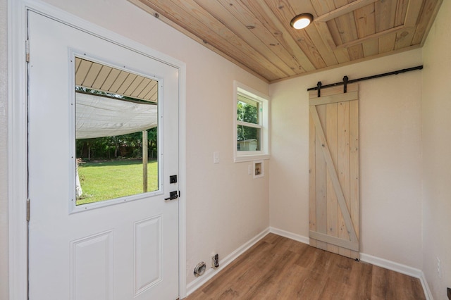 3375 Mclain Dr, Crestview, FL 32539 - washroom featuring a barn door, wood finished floors, hookup for a washing machine, and wood ceiling