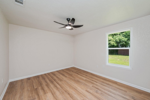 3375 Mclain Dr, Crestview, FL 32539 - spare room featuring light wood-style floors and ceiling fan