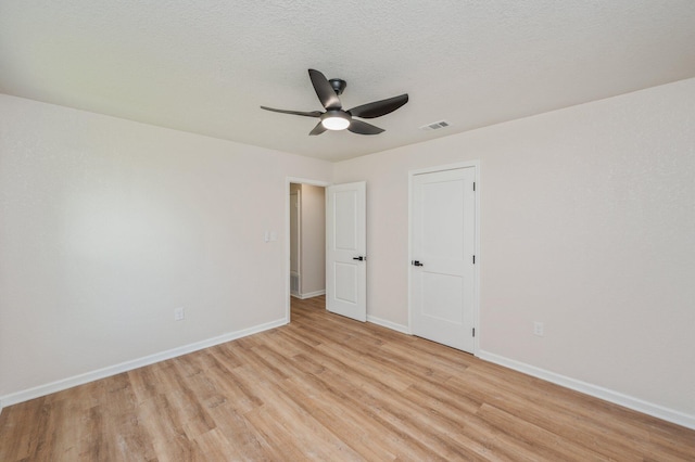 3375 Mclain Dr, Crestview, FL 32539 - unfurnished bedroom featuring light wood-type flooring and ceiling fan