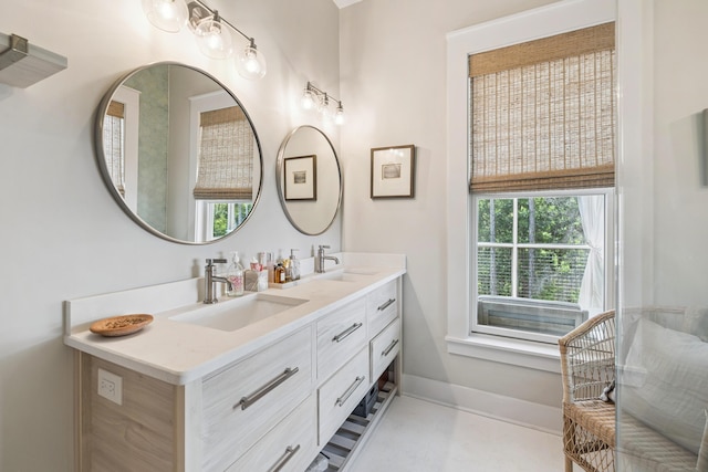 58 Pine Needle Way, Santa Rosa Beach, FL 32459 - bathroom with double vanity and baseboards