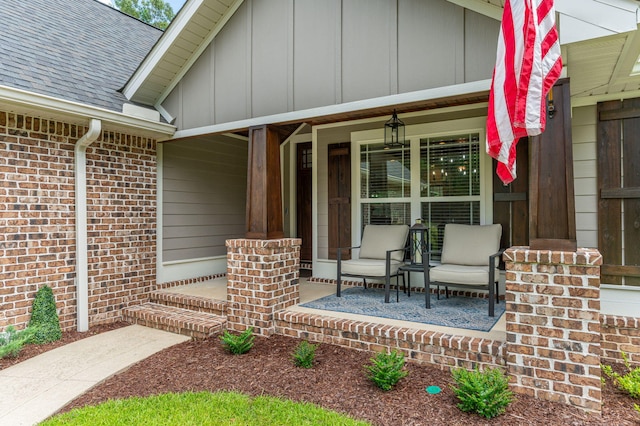 2580 Taylor Rd, Crestview, FL 32536 - doorway to property with a porch, brick siding, a shingled roof, and board and batten siding