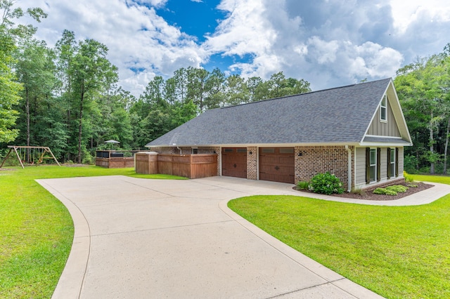 2580 Taylor Rd, Crestview, FL 32536 - view of front facade featuring brick siding, a front yard, board and batten siding, and concrete driveway