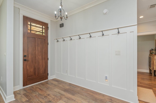 2580 Taylor Rd, Crestview, FL 32536 - mudroom featuring wood finished floors, a chandelier, ornamental molding, and recessed lighting