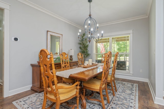 2580 Taylor Rd, Crestview, FL 32536 - dining area with a chandelier, ornamental molding, and dark wood-style floors