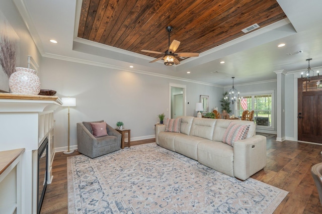 2580 Taylor Rd, Crestview, FL 32536 - living room featuring a chandelier, a raised ceiling, a fireplace, dark wood finished floors, and recessed lighting