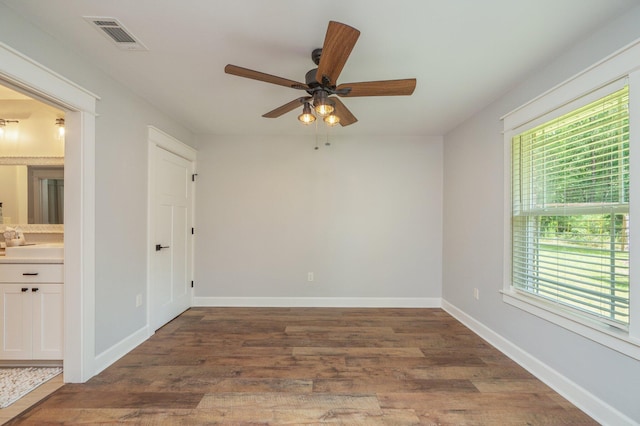 2580 Taylor Rd, Crestview, FL 32536 - spare room featuring a ceiling fan and wood finished floors