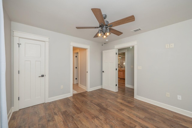 2580 Taylor Rd, Crestview, FL 32536 - unfurnished bedroom with wood finished floors and a ceiling fan