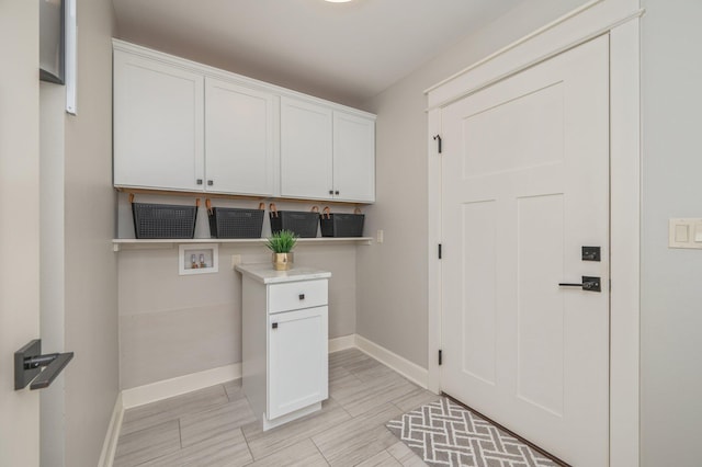 2580 Taylor Rd, Crestview, FL 32536 - washroom featuring hookup for a washing machine and cabinet space