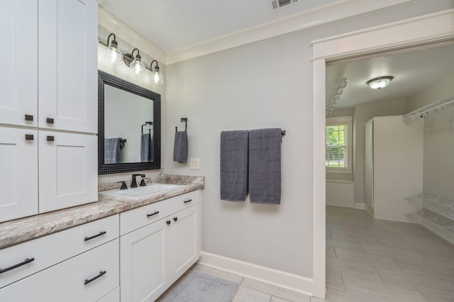 2580 Taylor Rd, Crestview, FL 32536 - full bathroom with vanity and baseboards