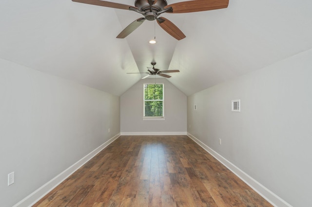 2580 Taylor Rd, Crestview, FL 32536 - additional living space with dark wood finished floors, a ceiling fan, and lofted ceiling