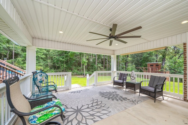 2580 Taylor Rd, Crestview, FL 32536 - view of patio / terrace featuring ceiling fan, view of scattered trees, and an outdoor structure