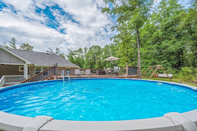 2580 Taylor Rd, Crestview, FL 32536 - outdoor pool featuring a wooden deck