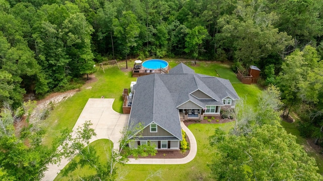 2580 Taylor Rd, Crestview, FL 32536 - view of subject property featuring a heavily wooded area and a pool