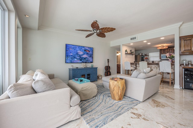 955 Scenic Gulf Dr Unit 350, Miramar Beach, FL 32550 - living area with beverage cooler, ornamental molding, a ceiling fan, light marble finish floors, and recessed lighting