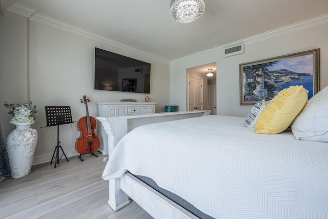 955 Scenic Gulf Dr Unit 350, Miramar Beach, FL 32550 - bedroom with ornamental molding and light wood-style floors