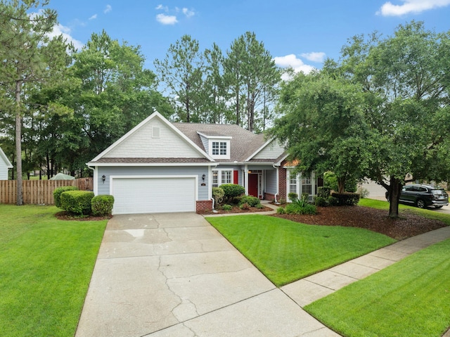 419 Symphony Way, Freeport, FL 32439 - view of front of property featuring an attached garage, concrete driveway, brick siding, and a shingled roof