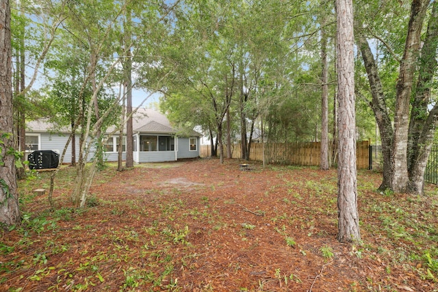 419 Symphony Way, Freeport, FL 32439 - view of yard with a sunroom