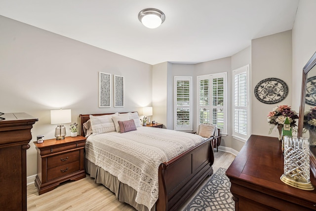 419 Symphony Way, Freeport, FL 32439 - bedroom featuring light wood finished floors and baseboards