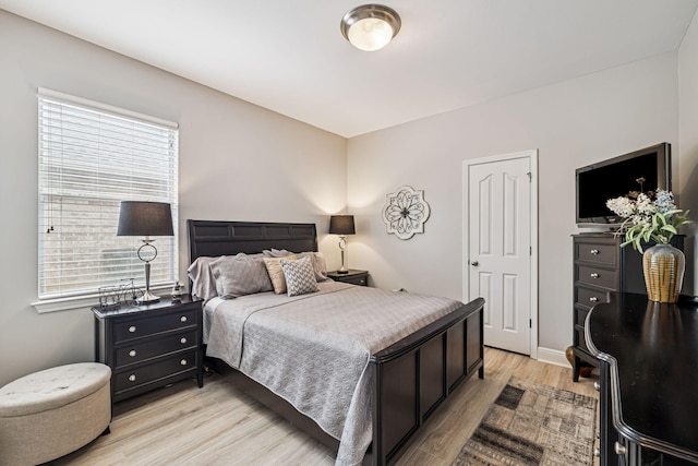 419 Symphony Way, Freeport, FL 32439 - bedroom with light wood-style flooring and baseboards