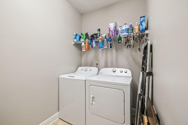 419 Symphony Way, Freeport, FL 32439 - washroom featuring washer and dryer and baseboards
