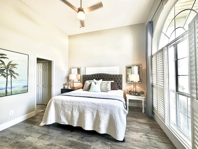 83 Azure Pl, Miramar Beach, FL 32550 - bedroom with wood finished floors, a high ceiling, and ceiling fan
