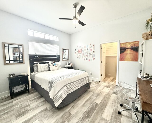 83 Azure Pl, Miramar Beach, FL 32550 - bedroom featuring light wood-style floors, a ceiling fan, and an office area