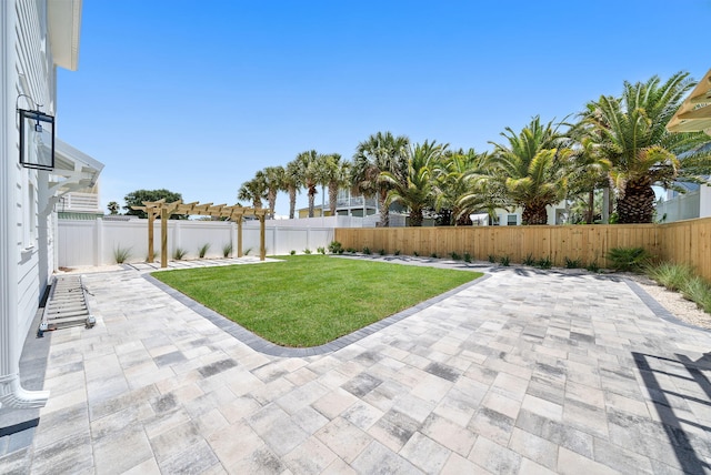 7215 Sunset Ave, Panama City Beach, FL 32408 - fenced backyard featuring a patio and a pergola