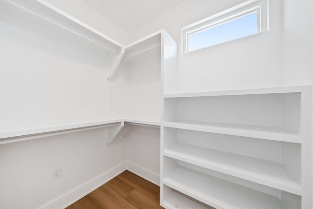 7215 Sunset Ave, Panama City Beach, FL 32408 - spacious closet with wood finished floors