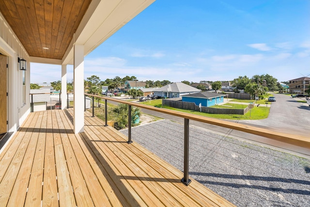 7215 Sunset Ave, Panama City Beach, FL 32408 - wooden terrace with a residential view