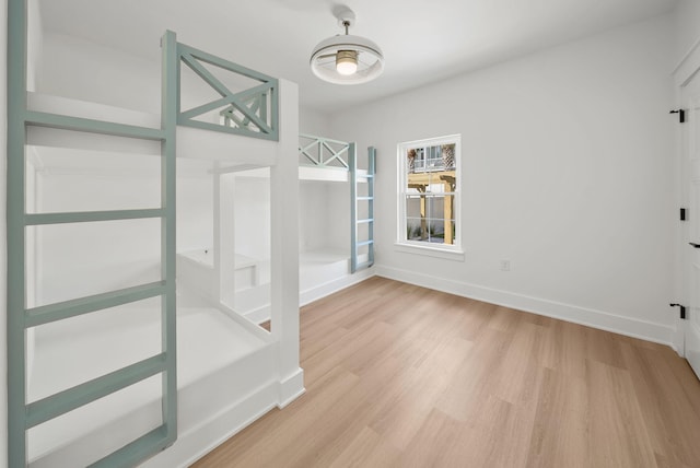 7215 Sunset Ave, Panama City Beach, FL 32408 - unfurnished room featuring light wood finished floors and baseboards