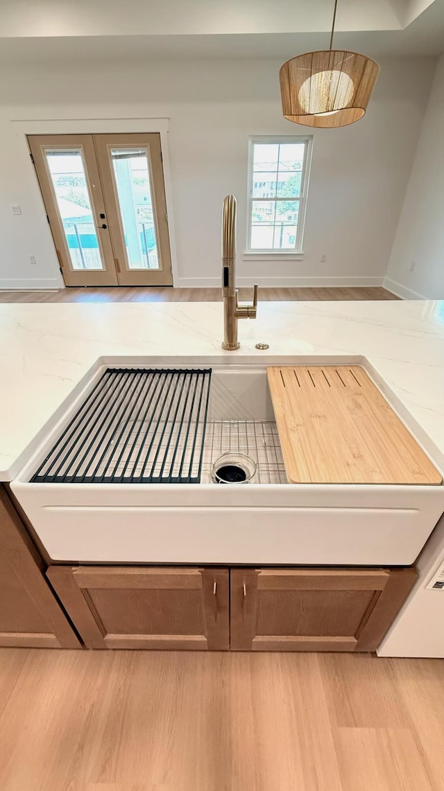 7215 Sunset Ave, Panama City Beach, FL 32408 - kitchen view of wood finished floors and french doors