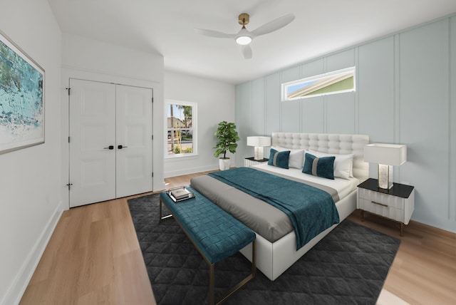 7215 Sunset Ave, Panama City Beach, FL 32408 - bedroom featuring wood finished floors, ceiling fan, and a closet