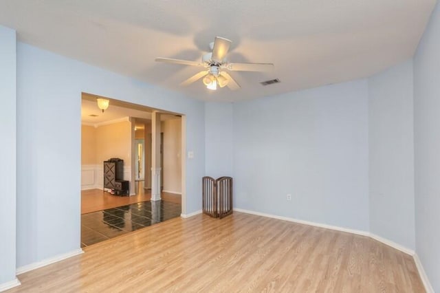 527 Tom Sawyer Ln, Crestview, FL 32536 - spare room with wood finished floors and ceiling fan