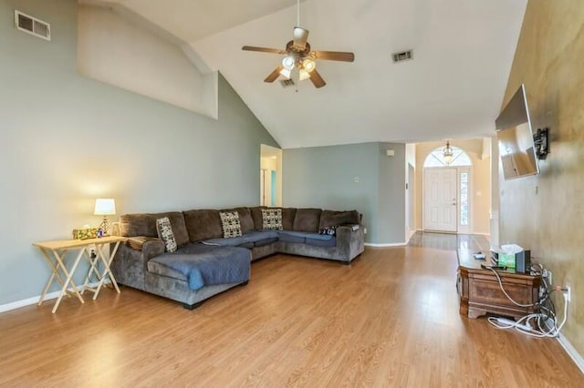 527 Tom Sawyer Ln, Crestview, FL 32536 - living area with wood finished floors, ceiling fan, and high vaulted ceiling