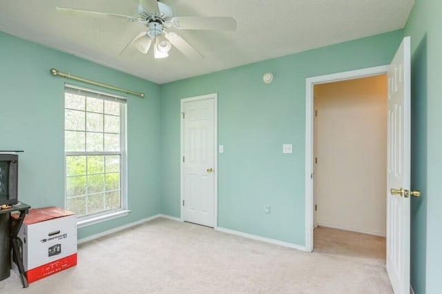 527 Tom Sawyer Ln, Crestview, FL 32536 - unfurnished bedroom featuring carpet flooring and ceiling fan