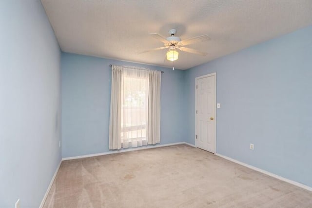 527 Tom Sawyer Ln, Crestview, FL 32536 - carpeted spare room featuring a ceiling fan and baseboards