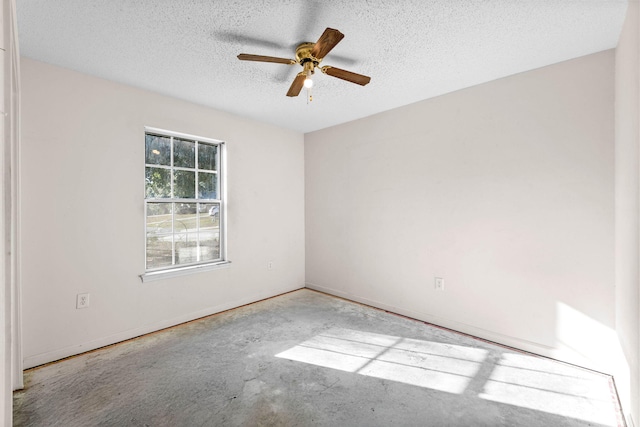 321 Timber Wind Dr, Defuniak Springs, FL 32433 - spare room featuring a ceiling fan and a textured ceiling