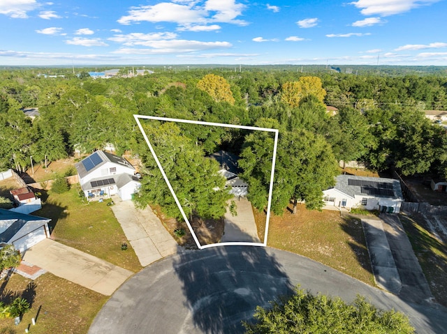 321 Timber Wind Dr, Defuniak Springs, FL 32433 - aerial view of property and surrounding area featuring a forest and property parcel outlined