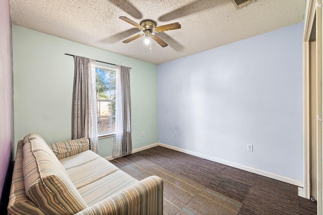 321 Timber Wind Dr, Defuniak Springs, FL 32433 - sitting room featuring a ceiling fan and a textured ceiling