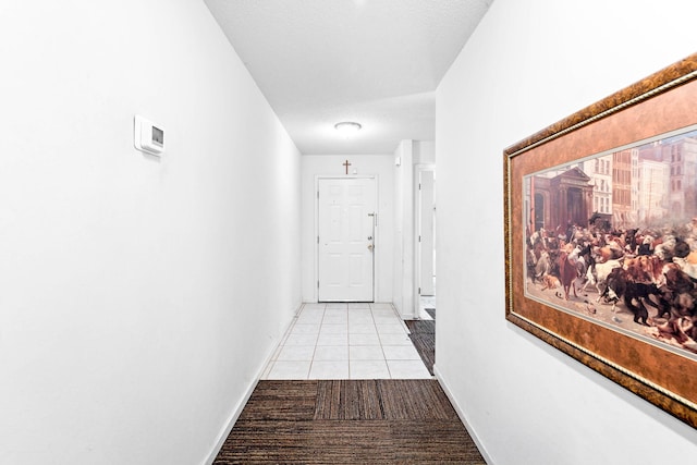 321 Timber Wind Dr, Defuniak Springs, FL 32433 - hallway featuring light tile patterned floors and baseboards