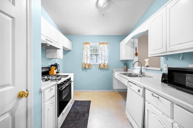321 Timber Wind Dr, Defuniak Springs, FL 32433 - kitchen with range with gas cooktop, dishwasher, light flooring, black microwave, and under cabinet range hood
